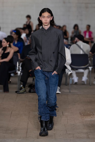 MILAN, ITALY - JUNE 19: A model walks the runway during the JW Anderson Ready to Wear Spring/Summer ...